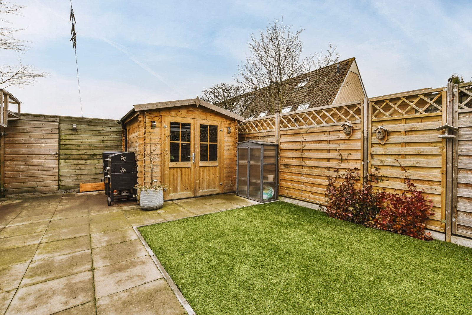 lawn and garden shed in suburban backyard 2026 03 18 13 54 13 utc scaled